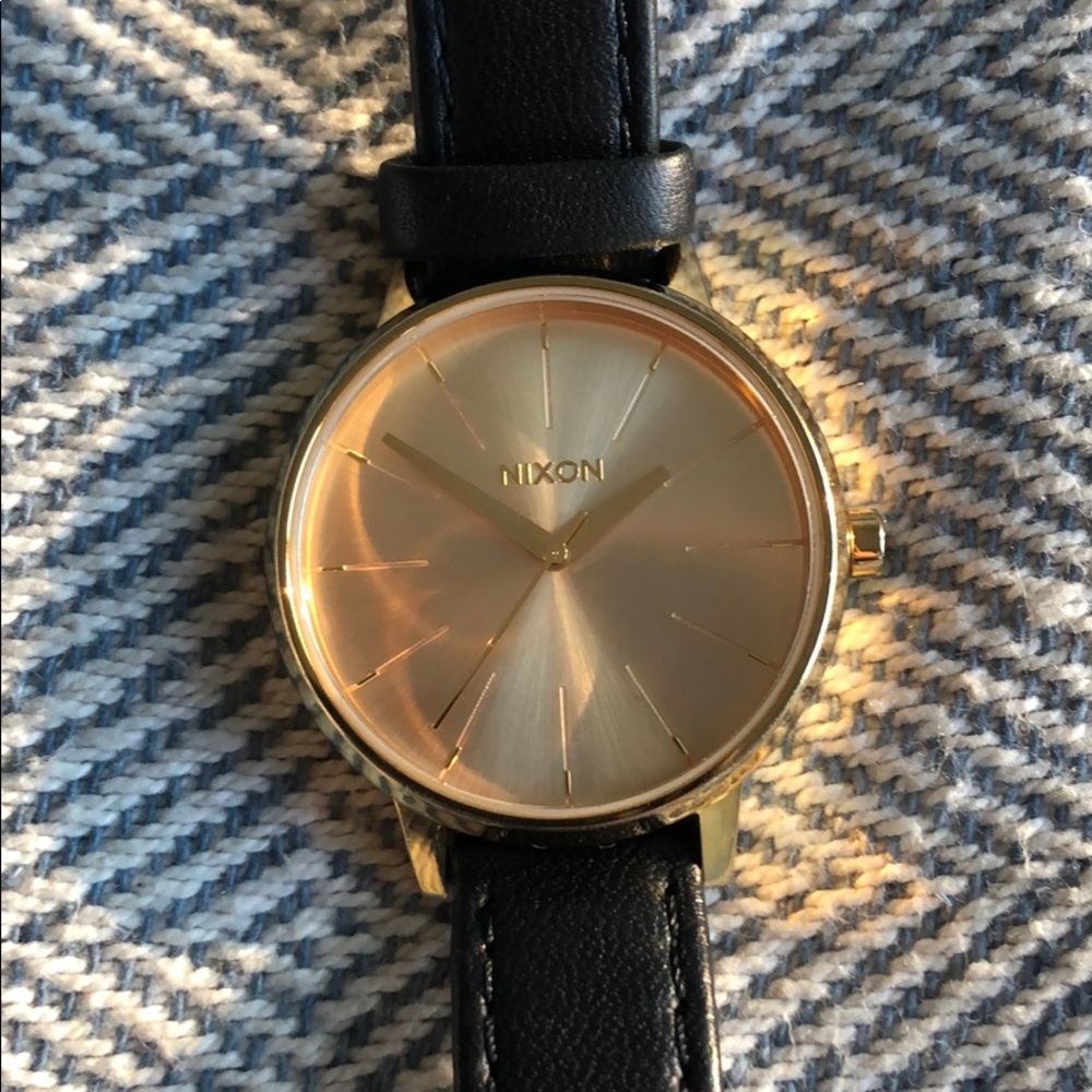 Nixon gold watch with leather band